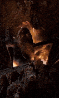 a picture of a dragon in a cave with the words karawan l on the bottom
