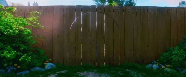 a wooden fence with a round hole in the middle of it