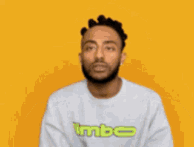a man with his eyes closed and a question mark on his forehead .
