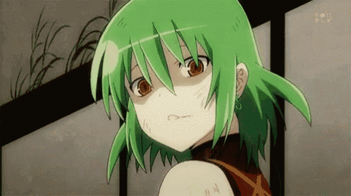 a girl with green hair and brown eyes is looking at something
