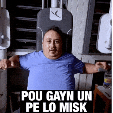 a man sitting on a machine with the words pou gayn un pe lo misk