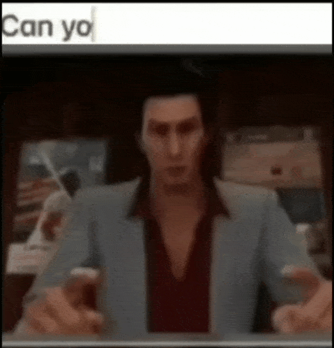 a man is holding a cell phone in front of a sign that says can you