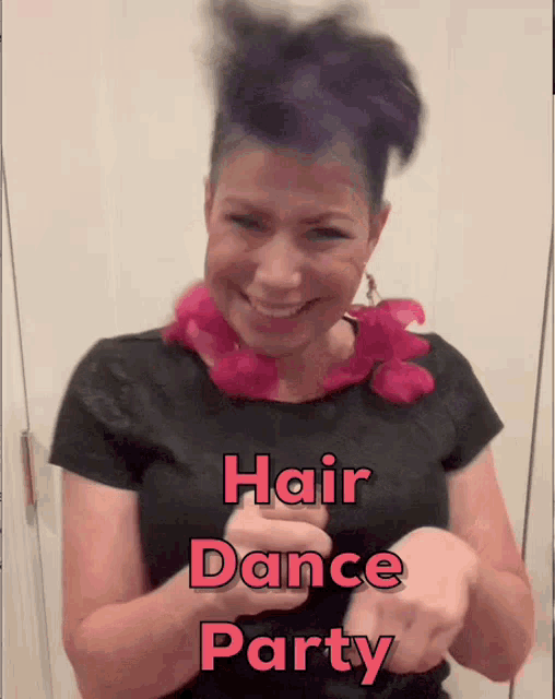 a woman with purple hair is smiling and wearing a black shirt that says " hair dance party " on it