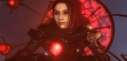 a woman with a cross on her forehead is standing in front of a red light