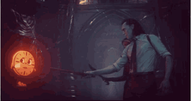 a man holding a sword in front of a clock with a face on it .