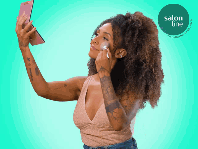 a woman is taking a selfie with a salon line logo in the background