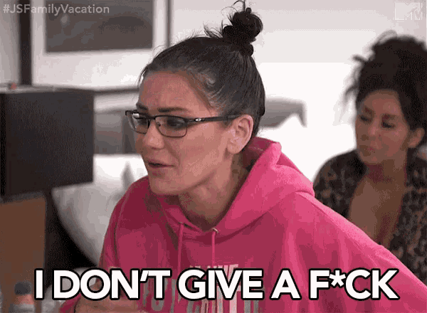 a woman in a pink hoodie says i don t give a f * ck