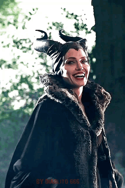 a picture of a woman with horns and the words by diablito 666 below her