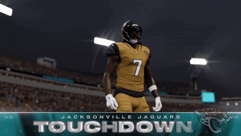 a jacksonville jaguars football player in a yellow uniform