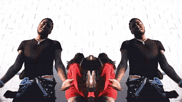 a man in a black shirt and a woman in a red shirt are dancing