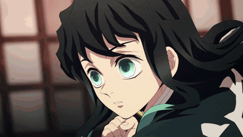 a close up of a person 's face with long black hair and blue eyes