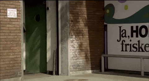 a brick wall with a sign that says ja ho friske on it