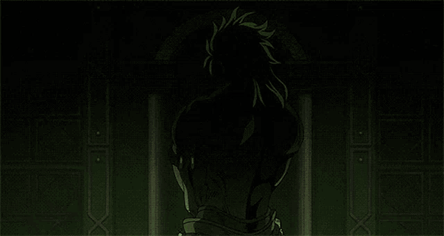 a close up of a person 's chest with a green light behind them