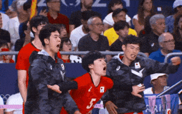 a man in a red shirt with the number 5 on it