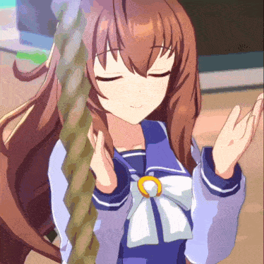 a girl in a sailor suit is holding a rope