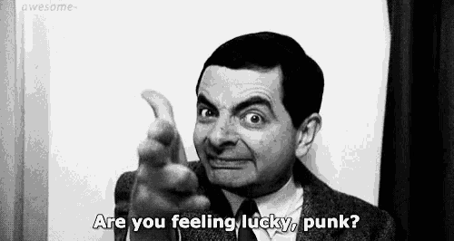 mr bean is pointing his finger at the camera and saying `` are you feeling lucky , punk ? ''