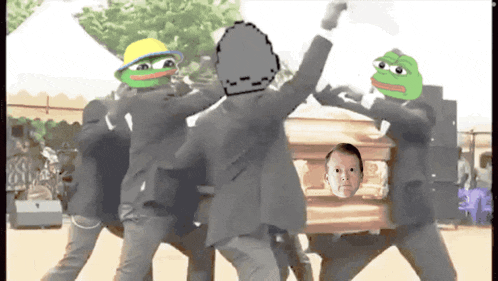 a group of people carrying a coffin with a frog on it