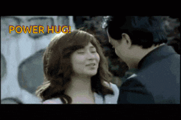 a man and a woman are hugging with the words power hug written above them