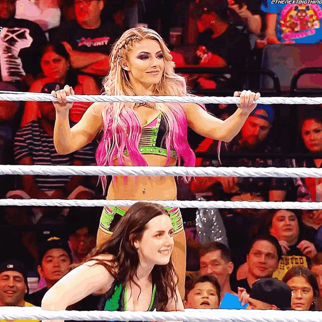 a woman in a wrestling ring with the hashtag #thenextbig thing on the bottom right