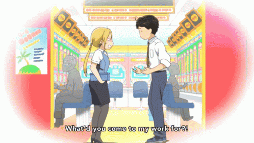 a man and a woman are standing in front of a sign that says what 'd you come to my work for ?