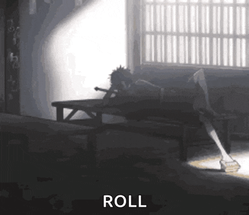 a person is laying on a bench in a dark room with a light shining through the window .