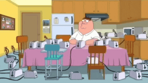 a cartoon of peter griffin sitting at a table with a bunch of toasters on it