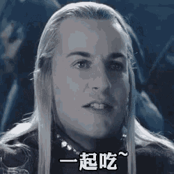 a man with long blonde hair is making a funny face in a movie .