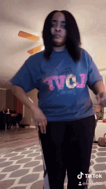 a woman wearing a shirt that says tcu on it