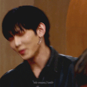 a close up of a person 's face with the words holy-yeosang tumblr in the bottom right corner