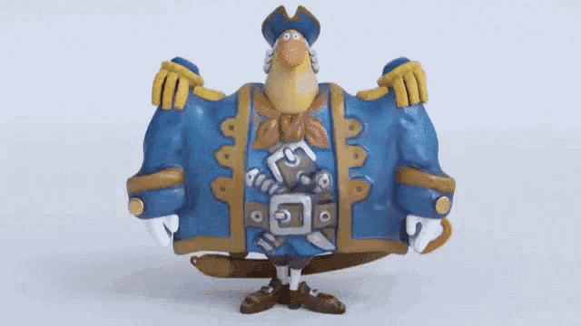 a cartoon figure of a pirate with a sword and a blue coat
