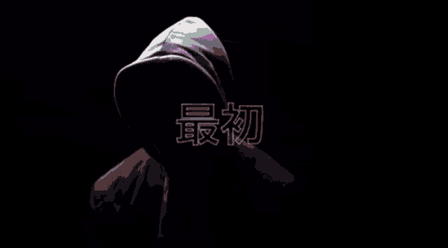 a person wearing a hooded jacket with the words first tennokage written on it .