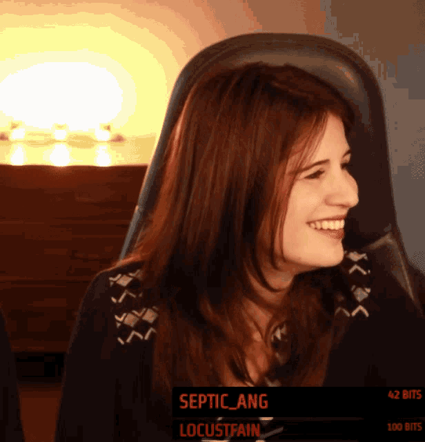 a woman sitting in a chair with the words septic ang locustfain on the screen
