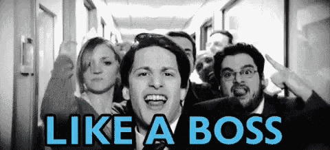 a group of people standing in a hallway with the words like a boss written in blue