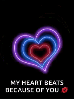 a colorful heart with the words `` my heart beats because of you '' written on it .