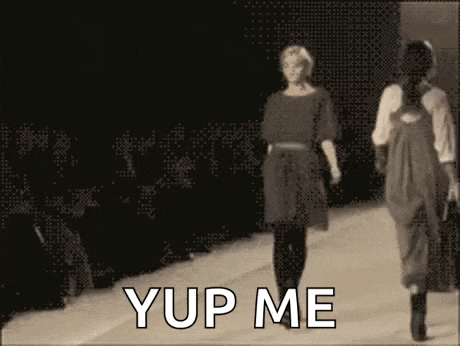 a woman walking down a runway with the words " yup me " written on the bottom