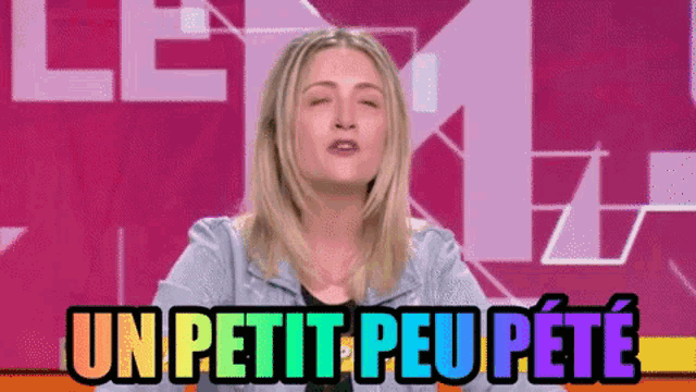 a woman in a denim jacket says un petit peu pete