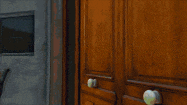a painting of a door with a few spots of yellow