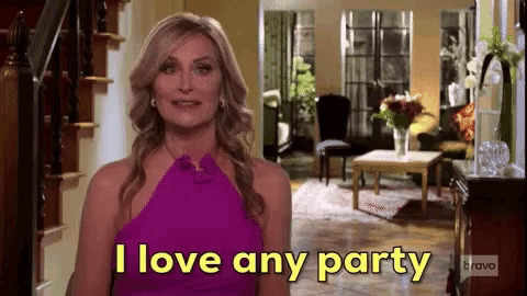a woman in a purple dress is saying i love any party
