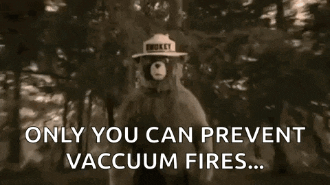 a bear wearing a hat that says smokey only you can prevent vaccum fires ...