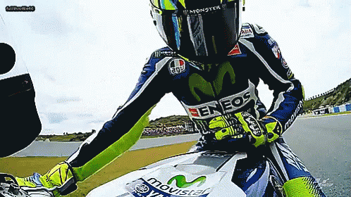 Valentino Rossi Moto Gp GIF - Valentino Rossi Moto Gp Stroking Motorcycle GIFs