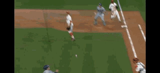 a baseball game is being played in a stadium with a budweiser ad in the outfield