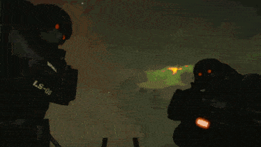 two soldiers are standing next to each other and one has a ls-05 sticker on it
