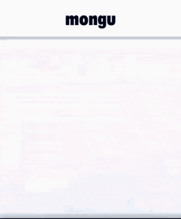 a blurred image of a table with the word mongu on it