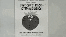 a black and white drawing of a strawberry with a cartoon face on it .