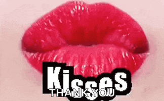 a close up of a woman 's red lips with the words `` kisses thank you '' written above it .
