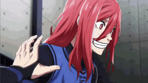 a girl with red hair is wearing a shirt that says team on it
