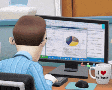 a man sitting in front of a computer with a mug that says i love my boss on it