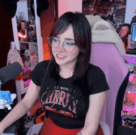 a woman wearing a black shirt that says cherry