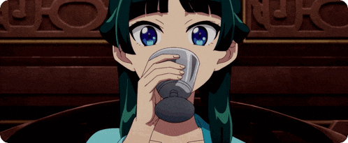 a girl with green hair is drinking from a cup with the letter o on it
