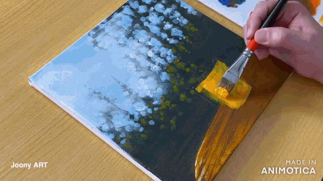 a person is painting a picture with a brush and the words made in animatica on the bottom